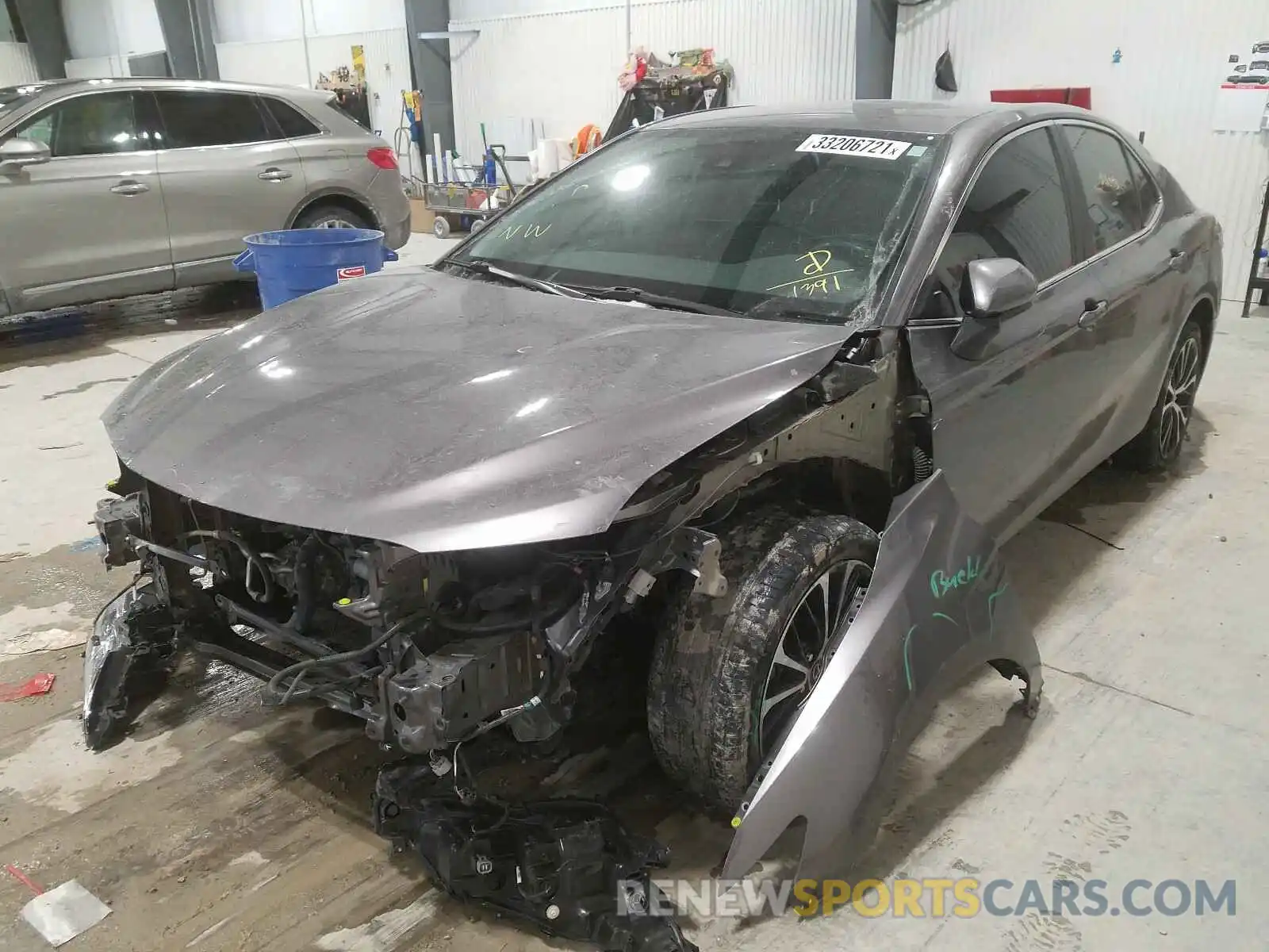 2 Photograph of a damaged car 4T1B11HK5KU721391 TOYOTA CAMRY 2019