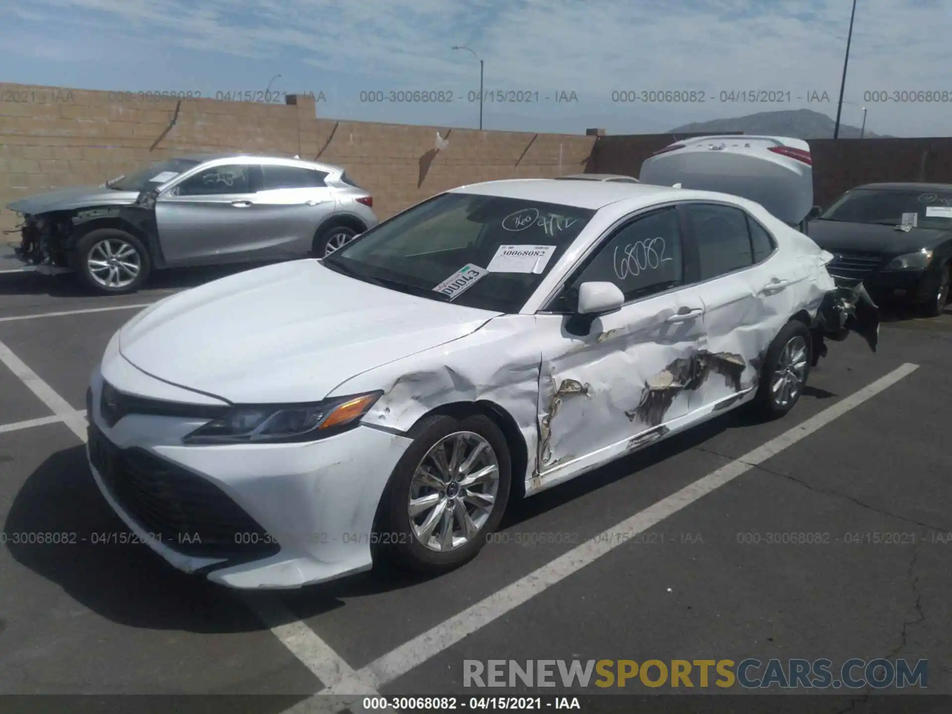 2 Photograph of a damaged car 4T1B11HK5KU721715 TOYOTA CAMRY 2019