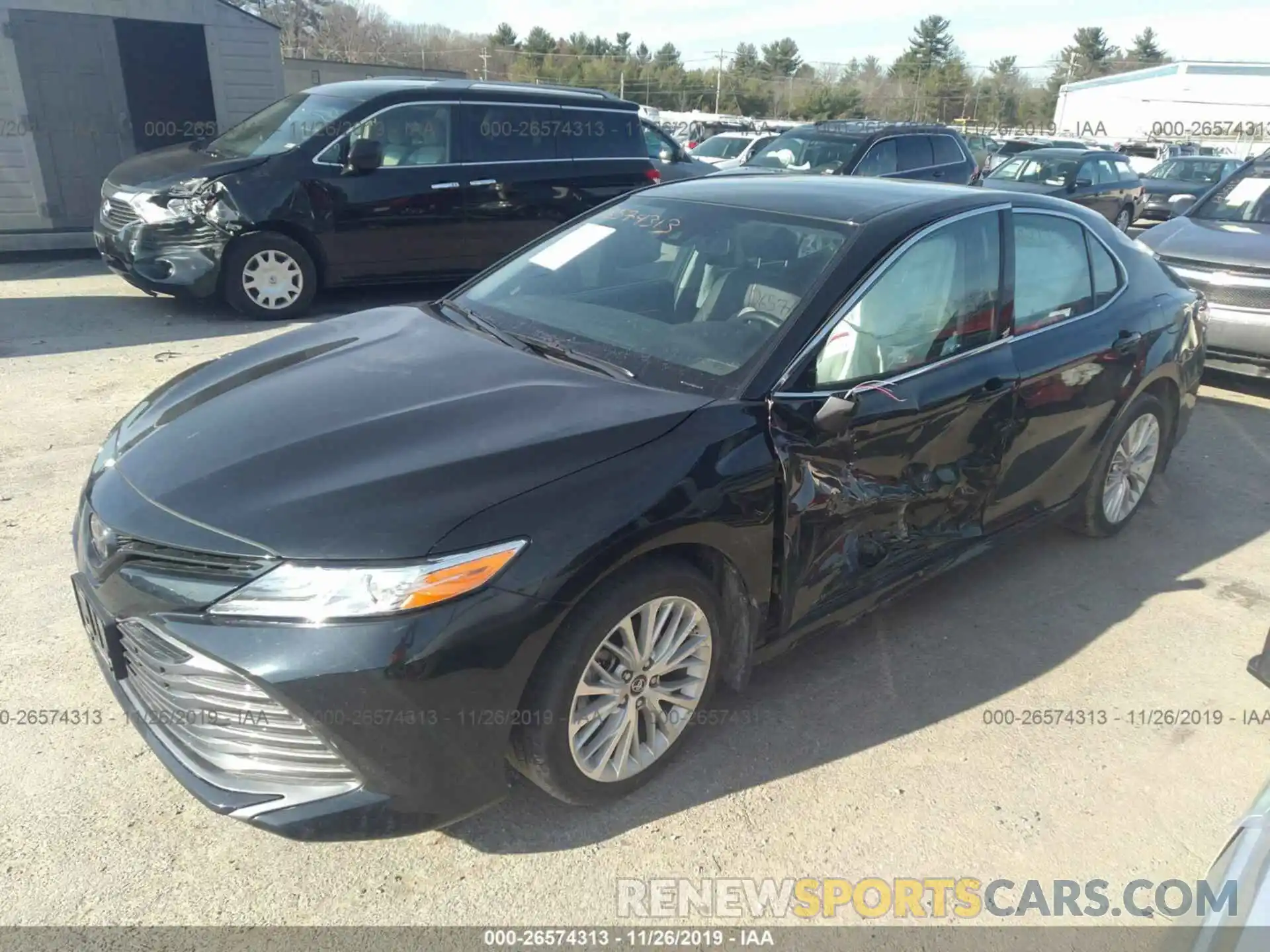 2 Photograph of a damaged car 4T1B11HK5KU722069 TOYOTA CAMRY 2019