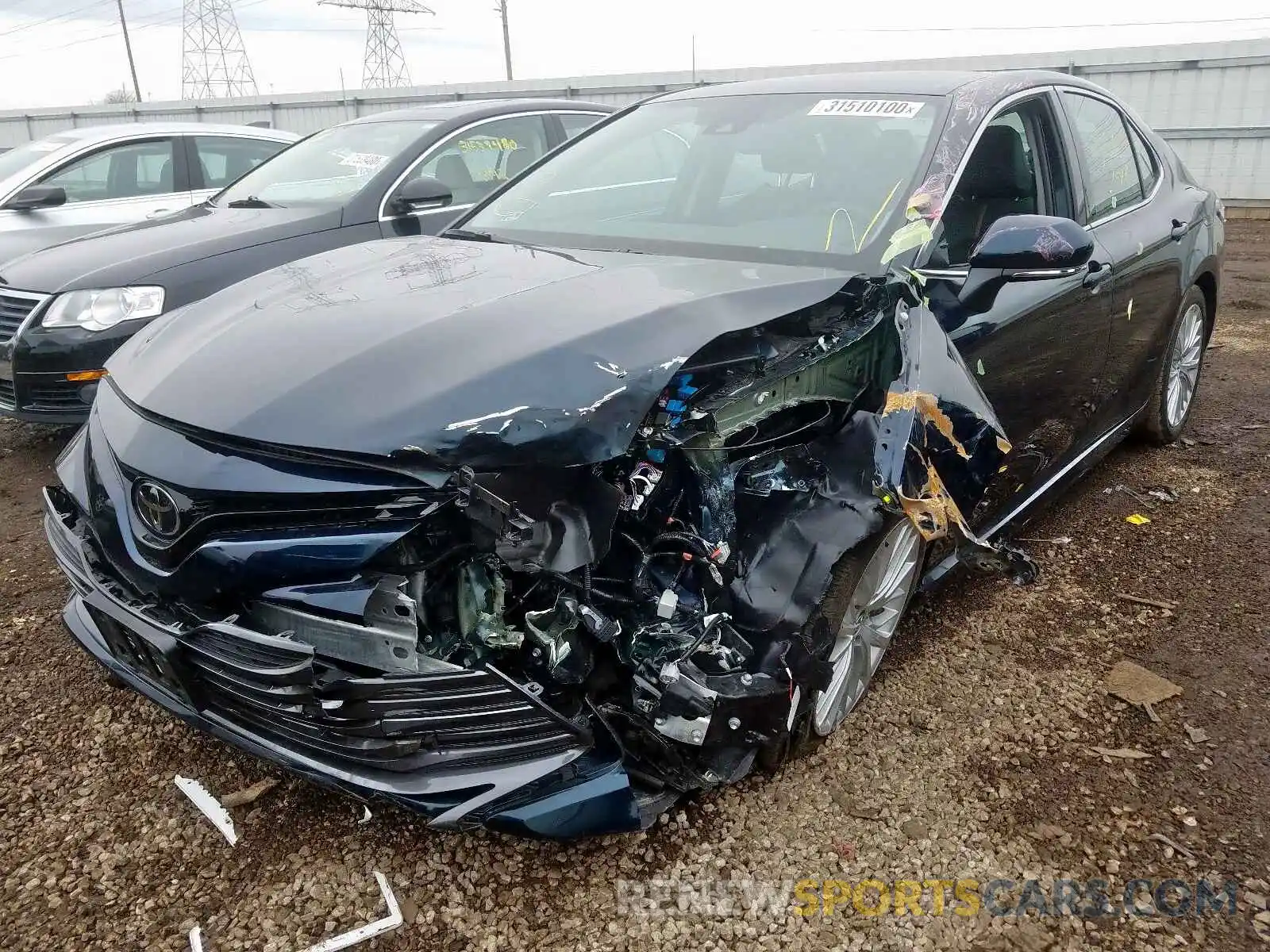 2 Photograph of a damaged car 4T1B11HK5KU728017 TOYOTA CAMRY 2019