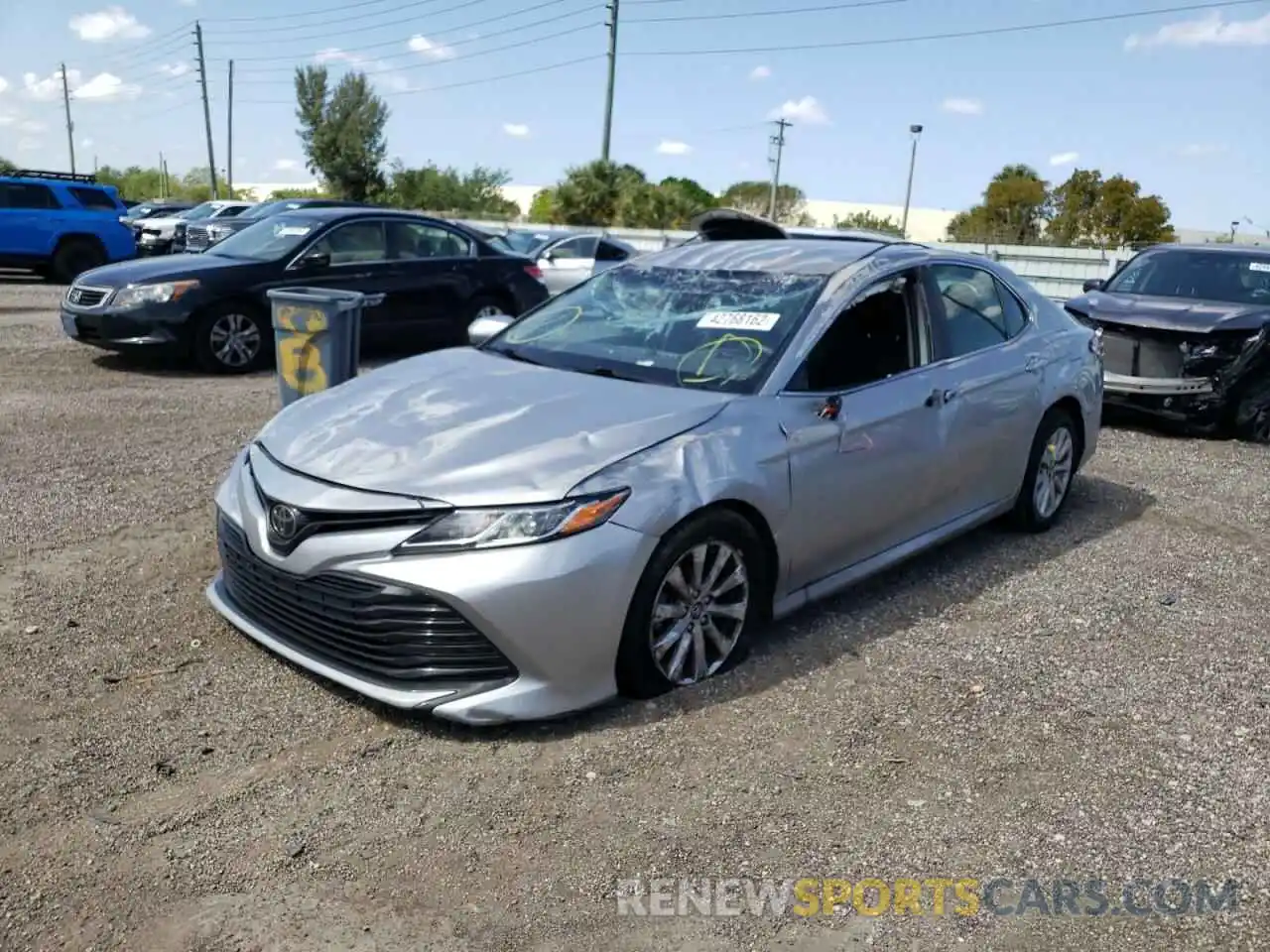 2 Photograph of a damaged car 4T1B11HK5KU731113 TOYOTA CAMRY 2019