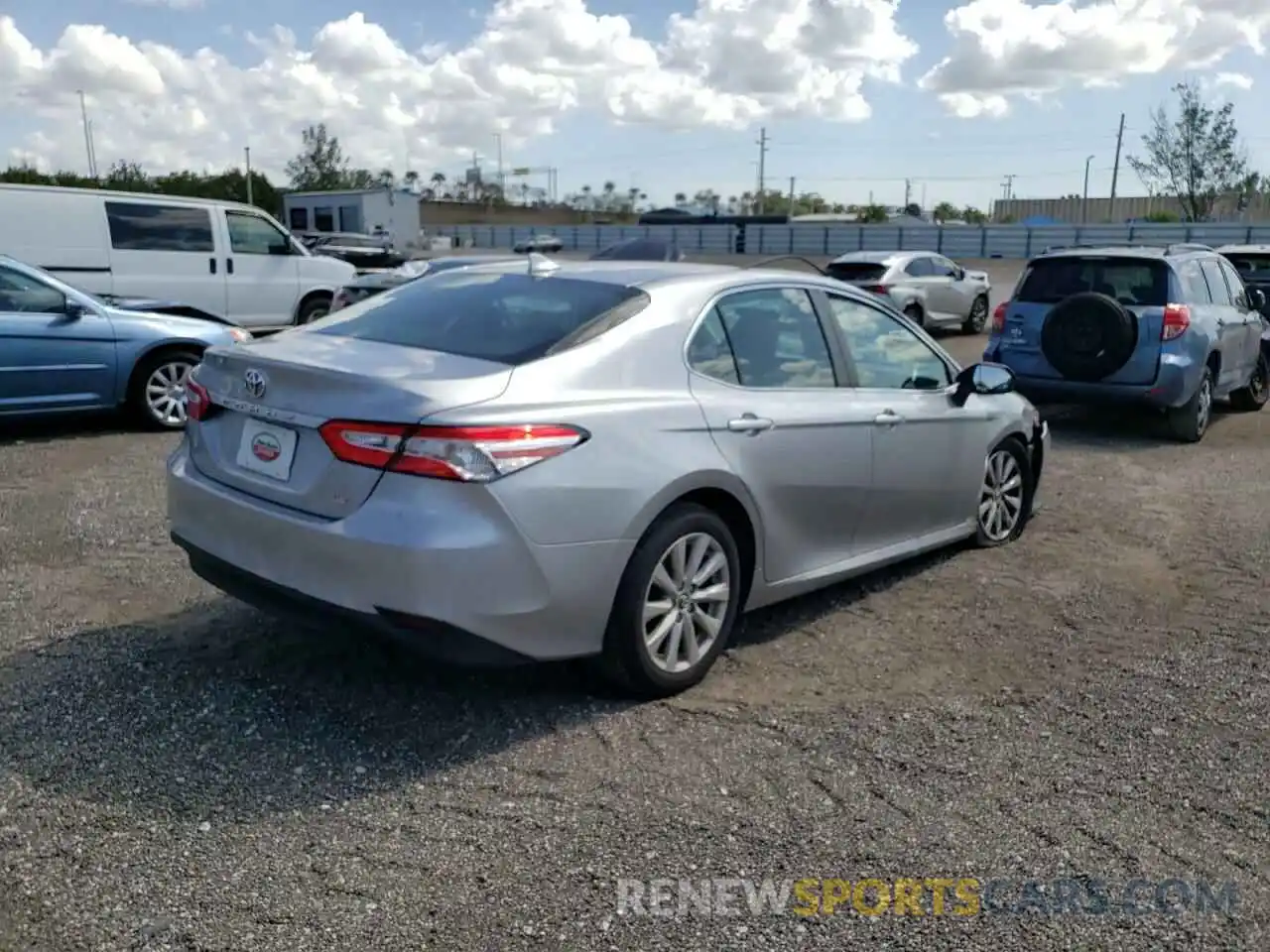 4 Photograph of a damaged car 4T1B11HK5KU731113 TOYOTA CAMRY 2019