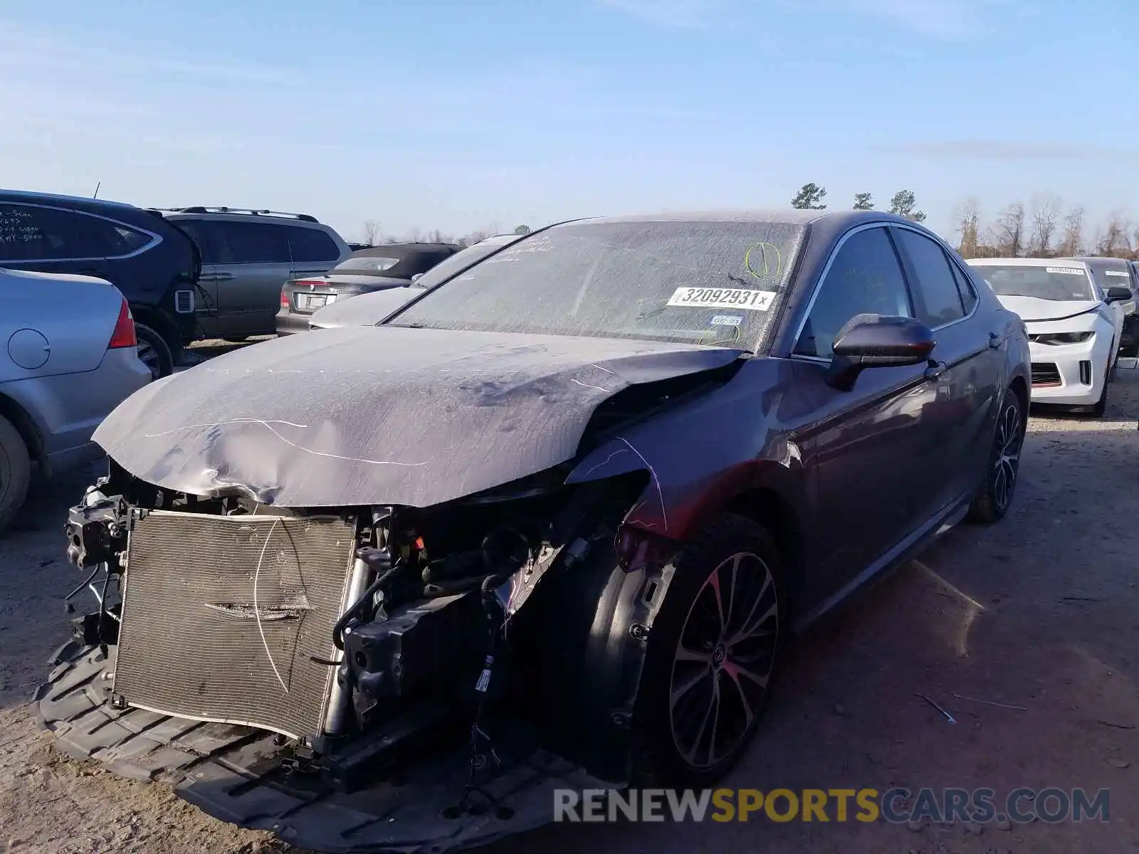 2 Photograph of a damaged car 4T1B11HK5KU734982 TOYOTA CAMRY 2019