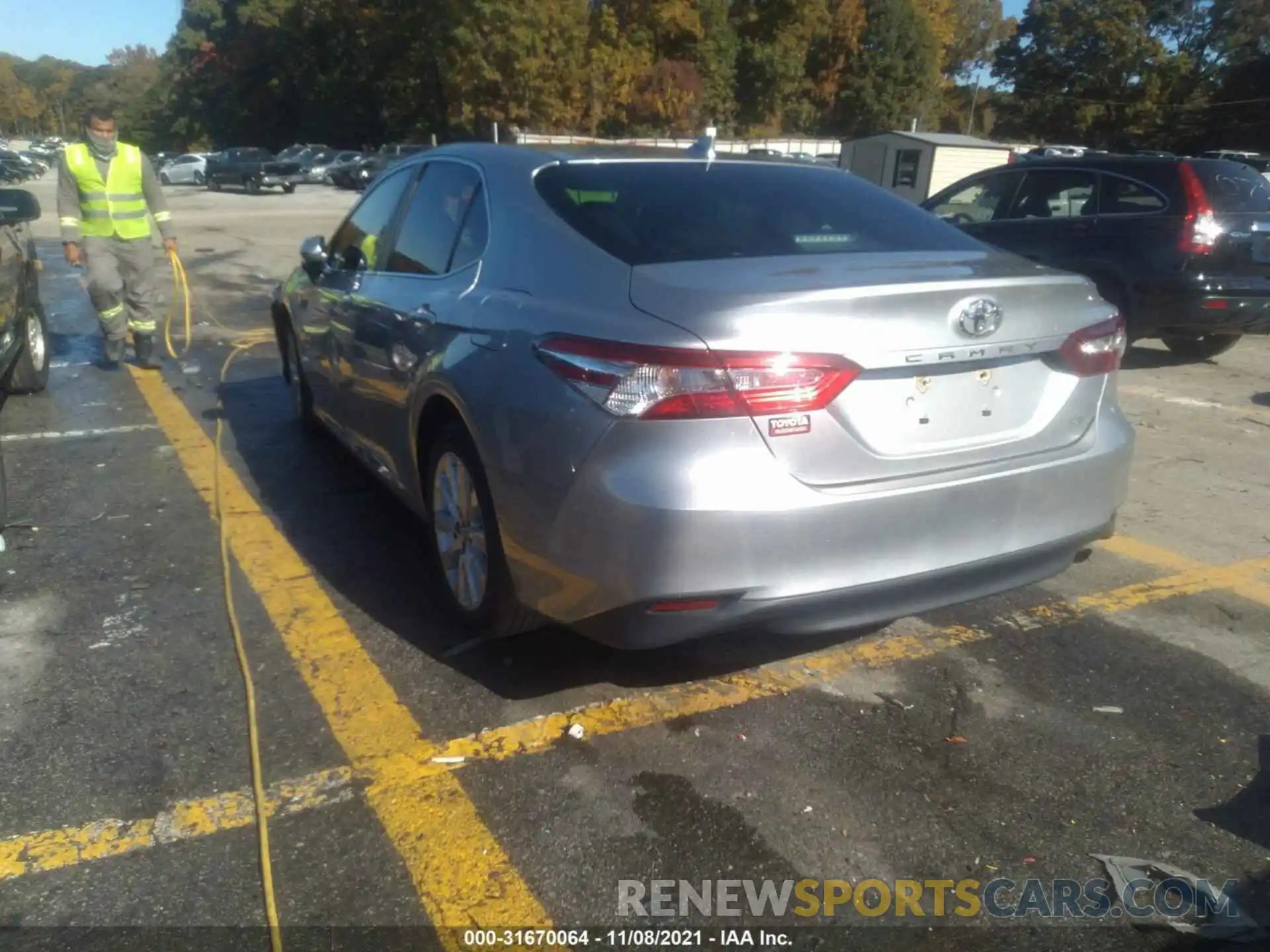 3 Photograph of a damaged car 4T1B11HK5KU735033 TOYOTA CAMRY 2019