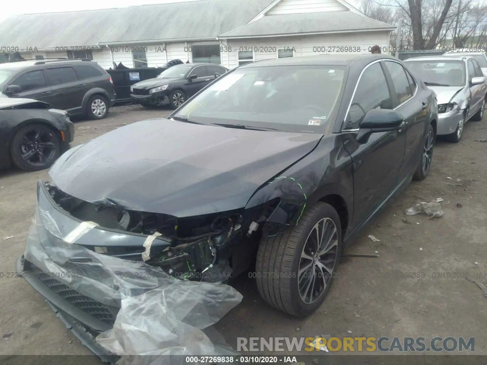 2 Photograph of a damaged car 4T1B11HK5KU738093 TOYOTA CAMRY 2019