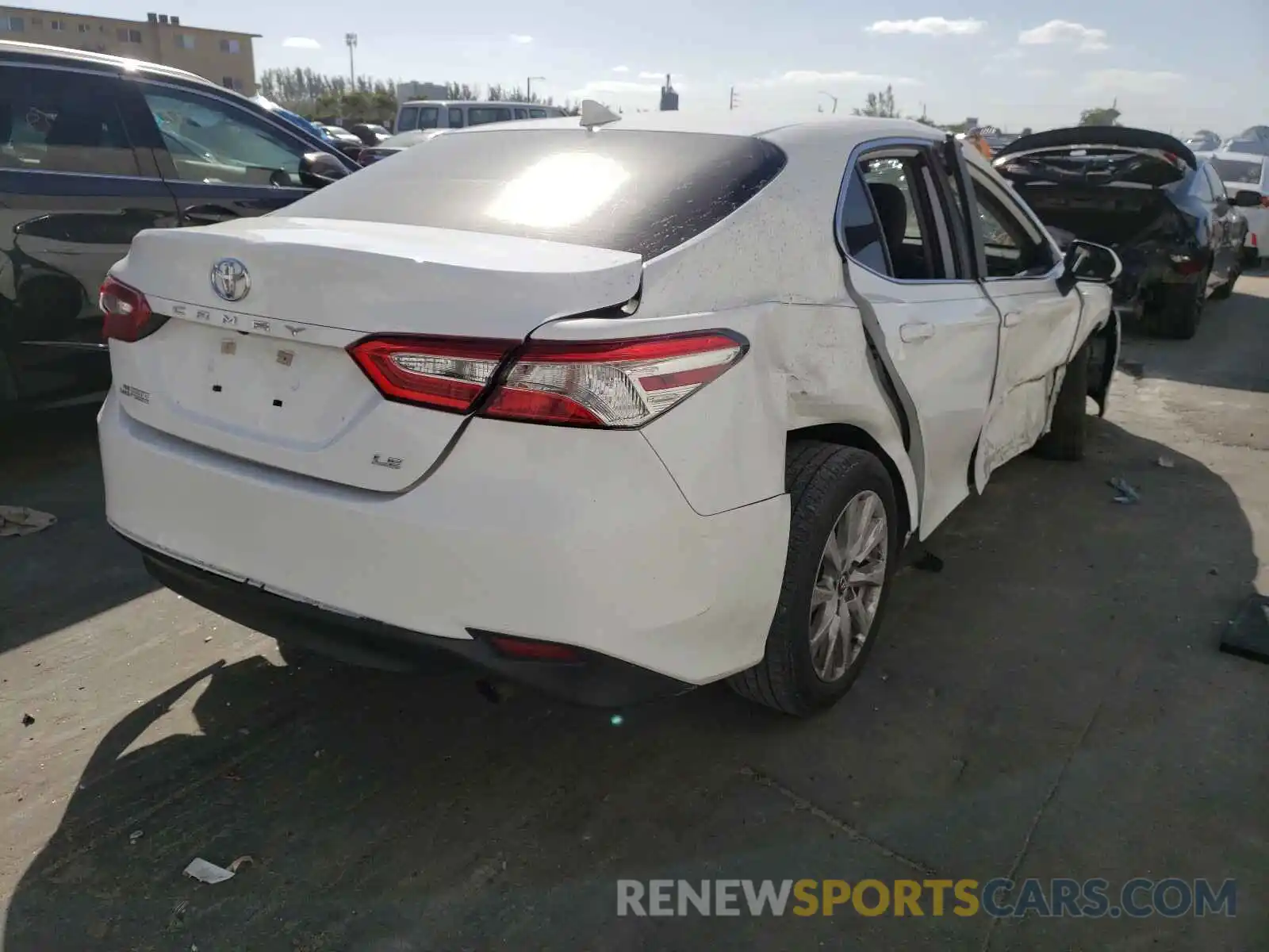 4 Photograph of a damaged car 4T1B11HK5KU740362 TOYOTA CAMRY 2019