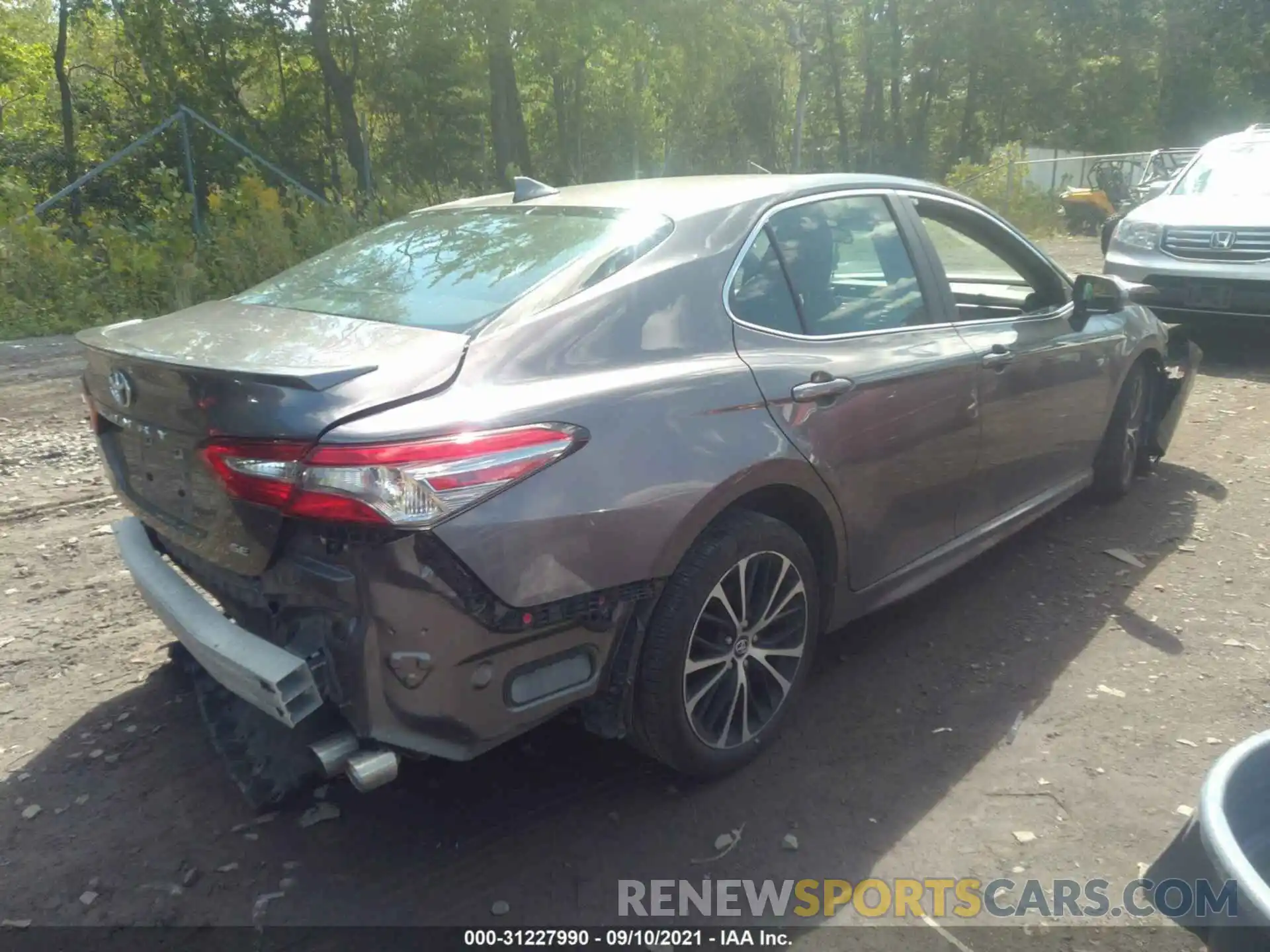 4 Photograph of a damaged car 4T1B11HK5KU740698 TOYOTA CAMRY 2019