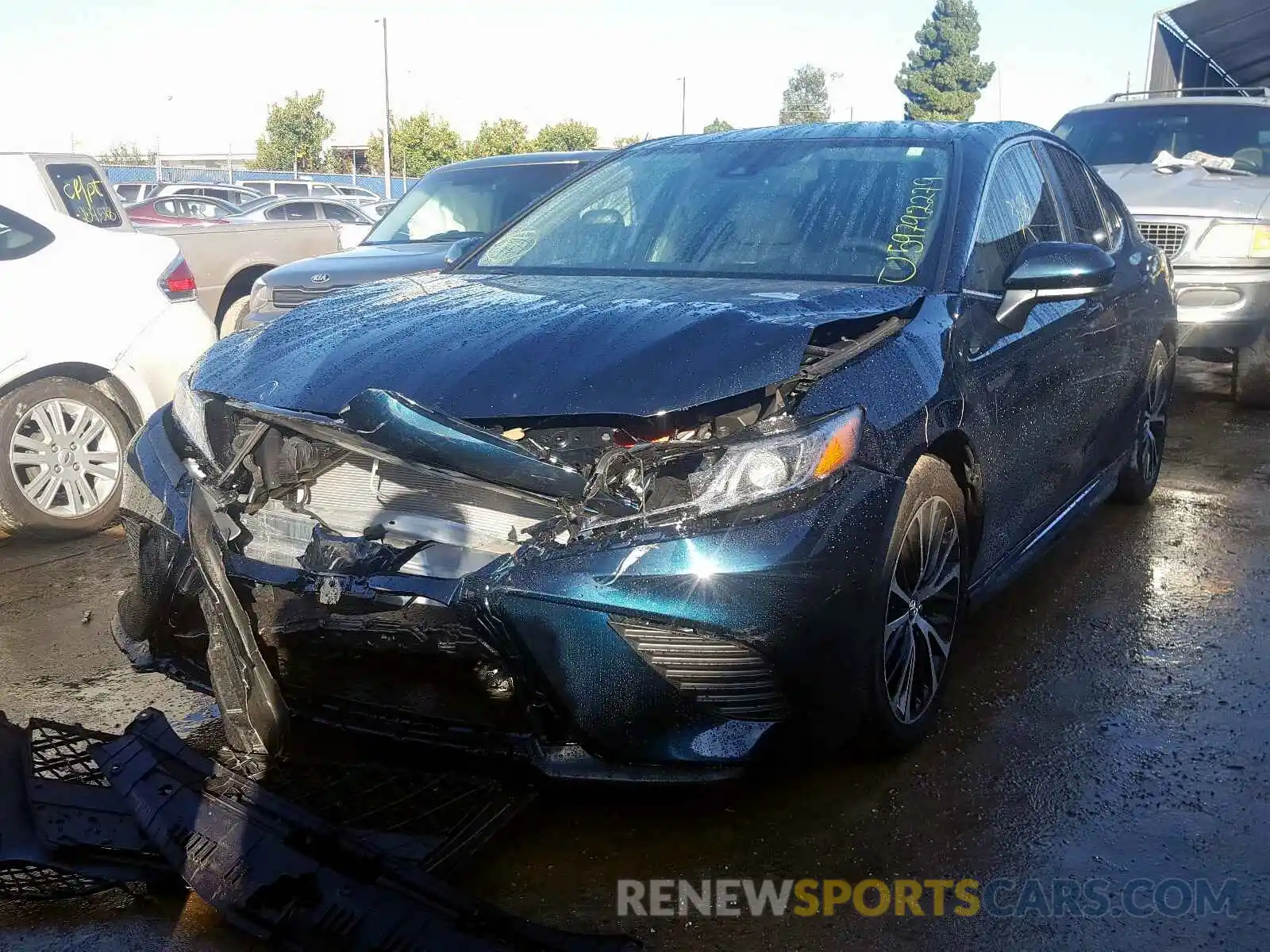 2 Photograph of a damaged car 4T1B11HK5KU741768 TOYOTA CAMRY 2019