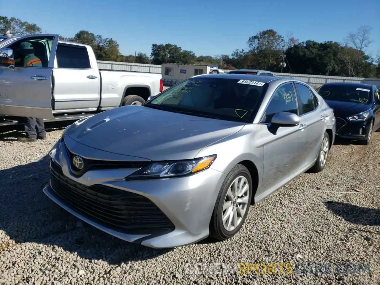 2 Photograph of a damaged car 4T1B11HK5KU743147 TOYOTA CAMRY 2019