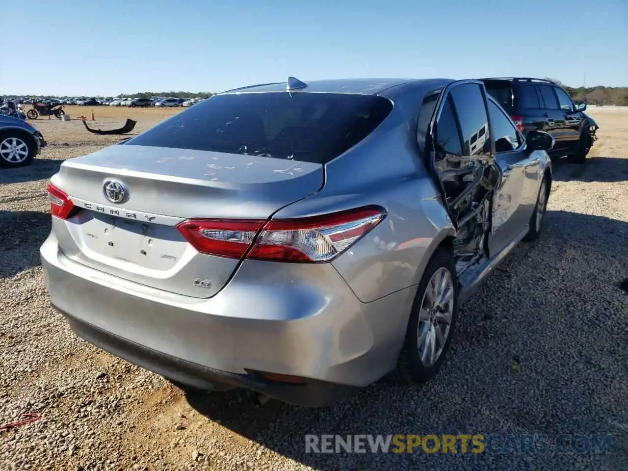 4 Photograph of a damaged car 4T1B11HK5KU743147 TOYOTA CAMRY 2019