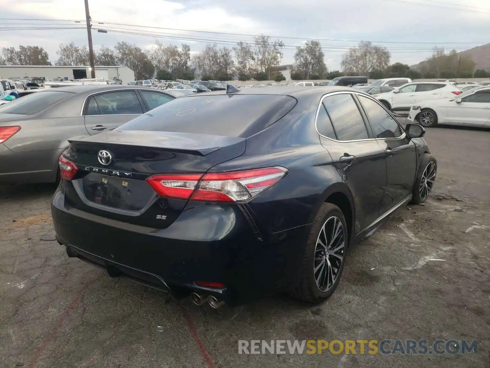 4 Photograph of a damaged car 4T1B11HK5KU745173 TOYOTA CAMRY 2019