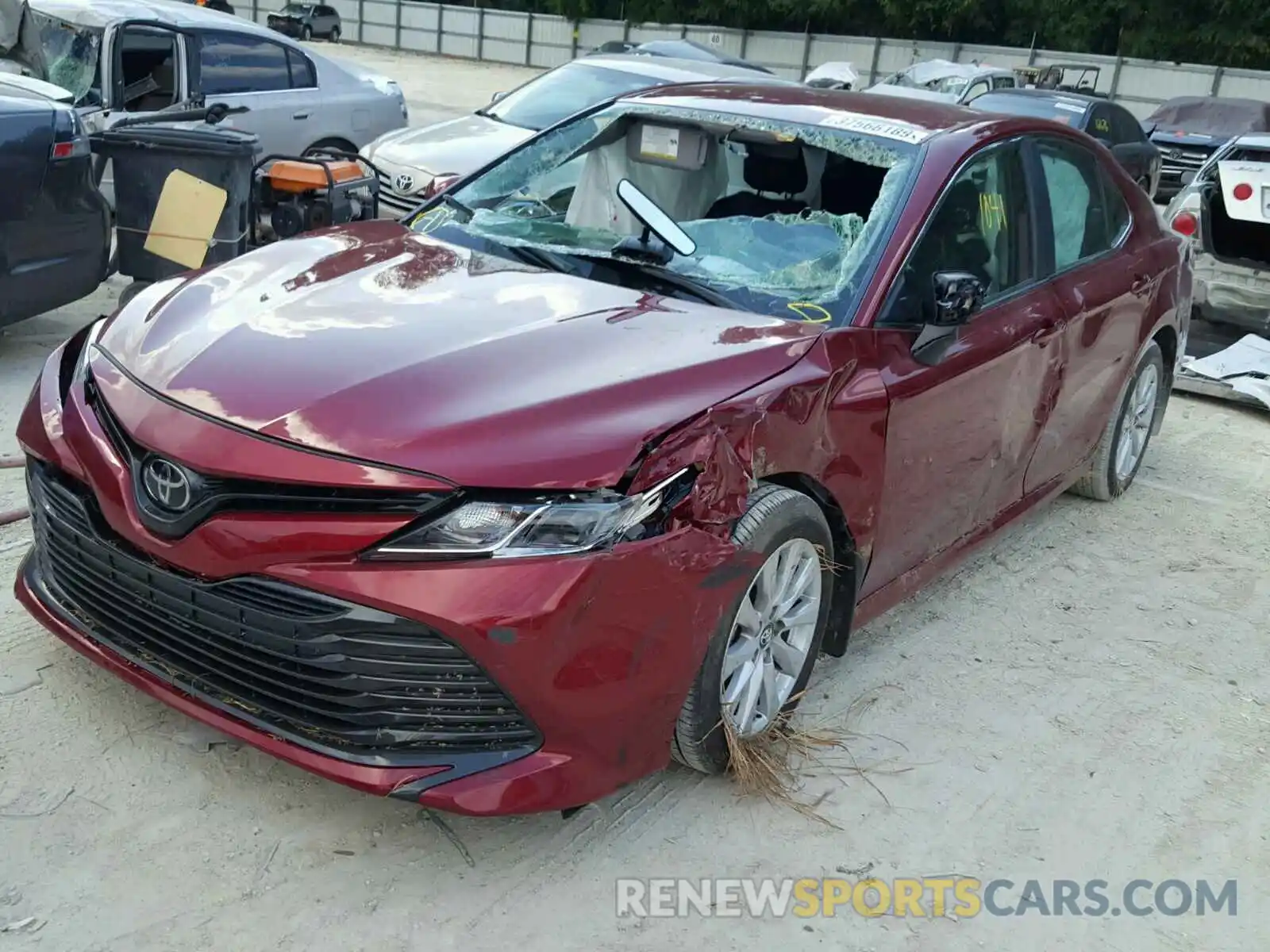 2 Photograph of a damaged car 4T1B11HK5KU746128 TOYOTA CAMRY 2019