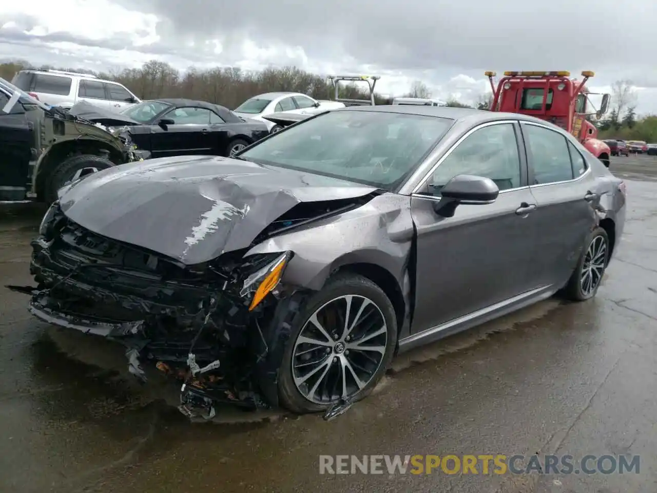 2 Photograph of a damaged car 4T1B11HK5KU746159 TOYOTA CAMRY 2019