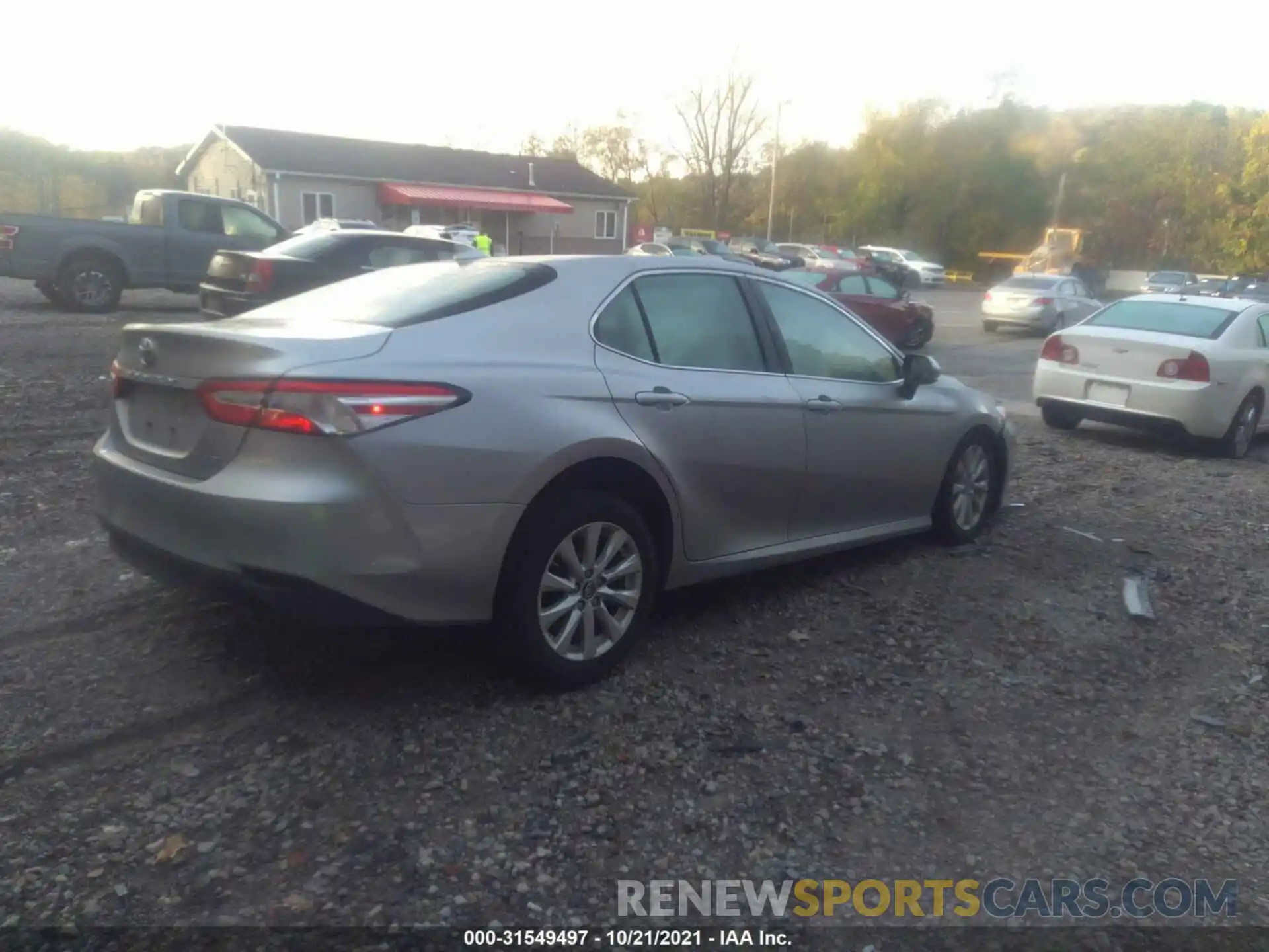 4 Photograph of a damaged car 4T1B11HK5KU747618 TOYOTA CAMRY 2019