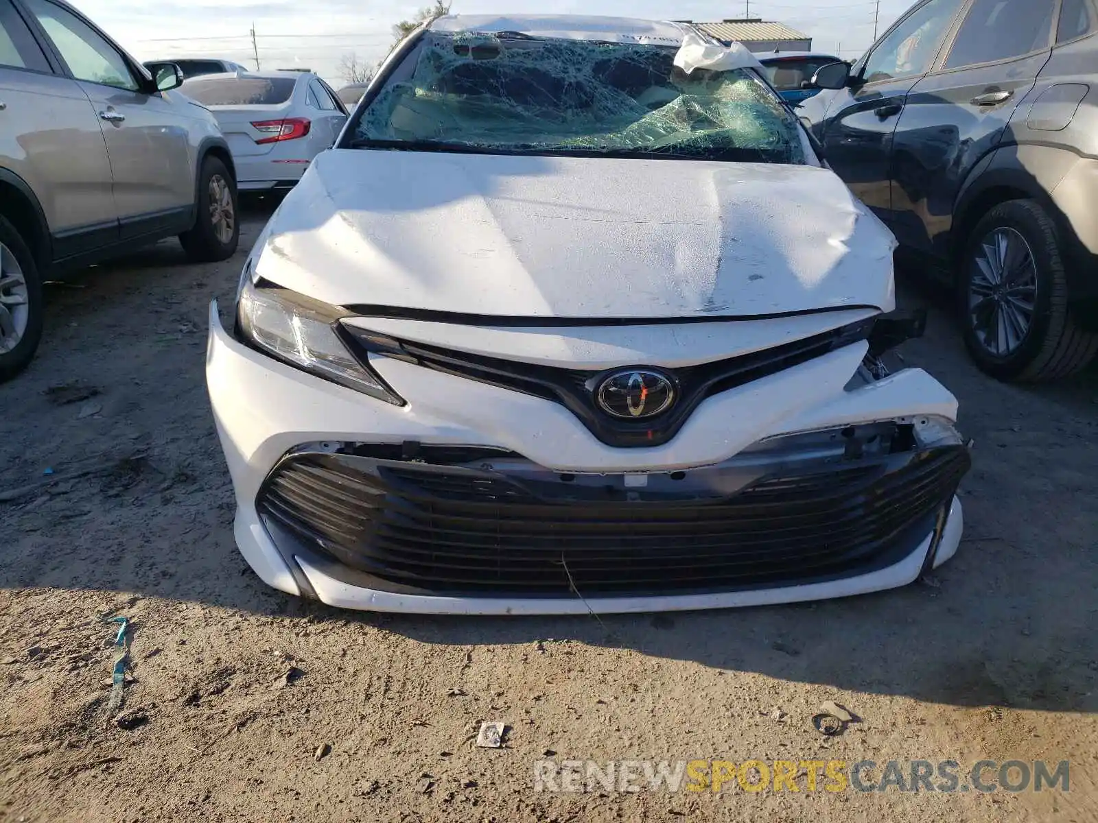 7 Photograph of a damaged car 4T1B11HK5KU748901 TOYOTA CAMRY 2019