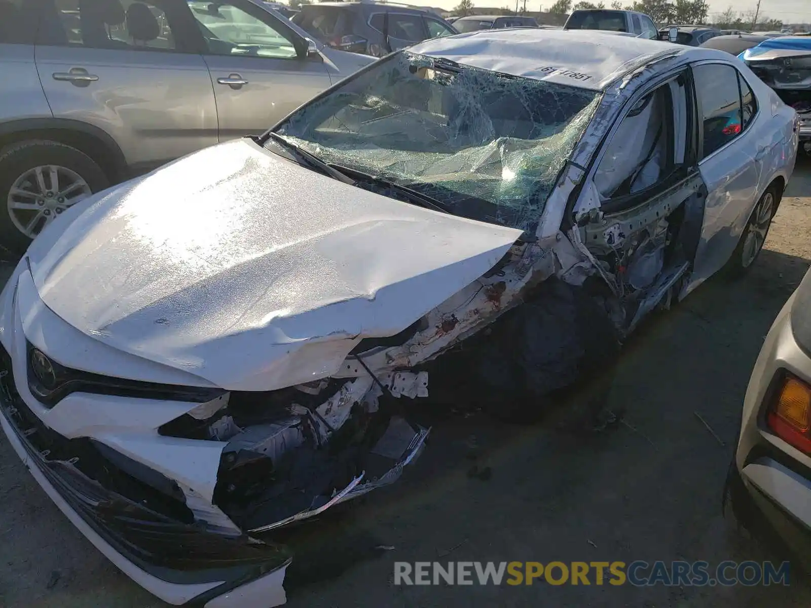 9 Photograph of a damaged car 4T1B11HK5KU748901 TOYOTA CAMRY 2019