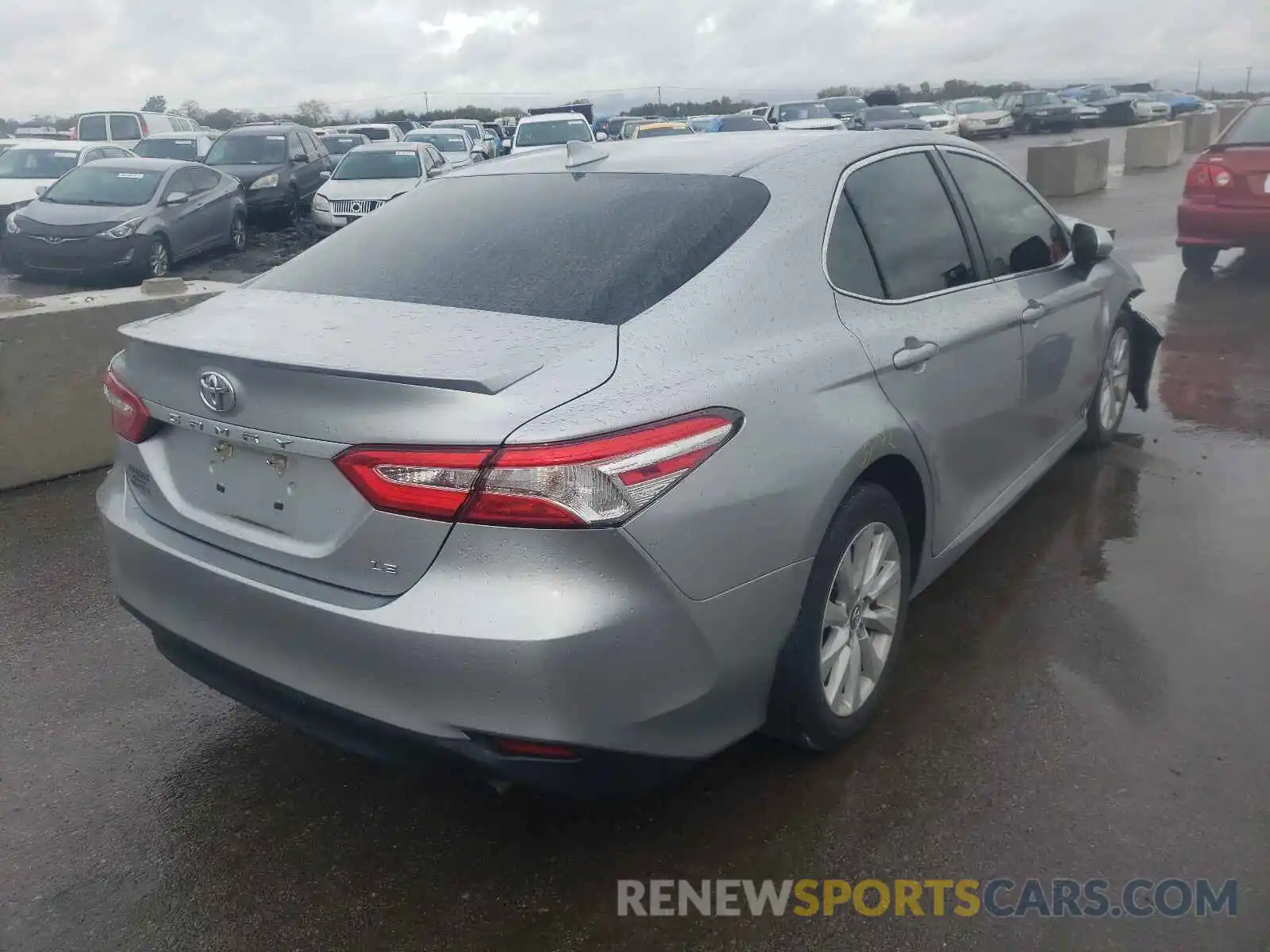 4 Photograph of a damaged car 4T1B11HK5KU749479 TOYOTA CAMRY 2019