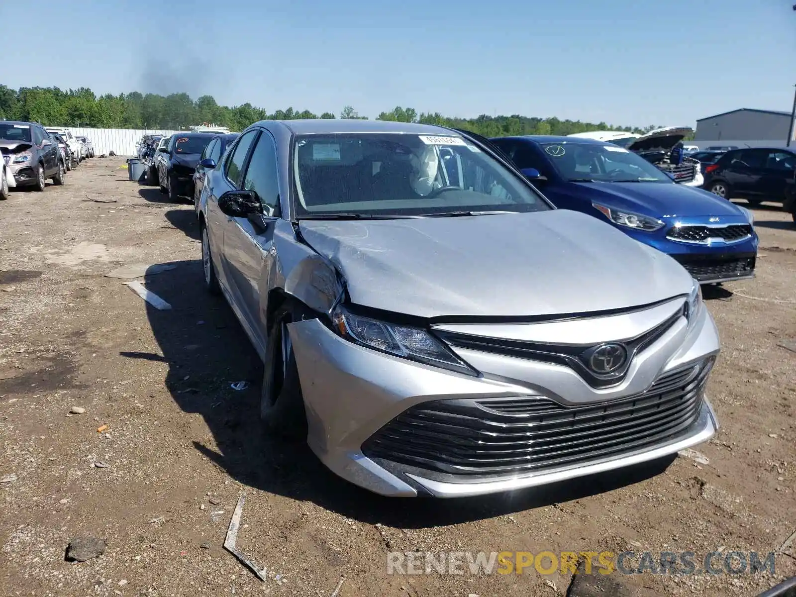 1 Photograph of a damaged car 4T1B11HK5KU752334 TOYOTA CAMRY 2019