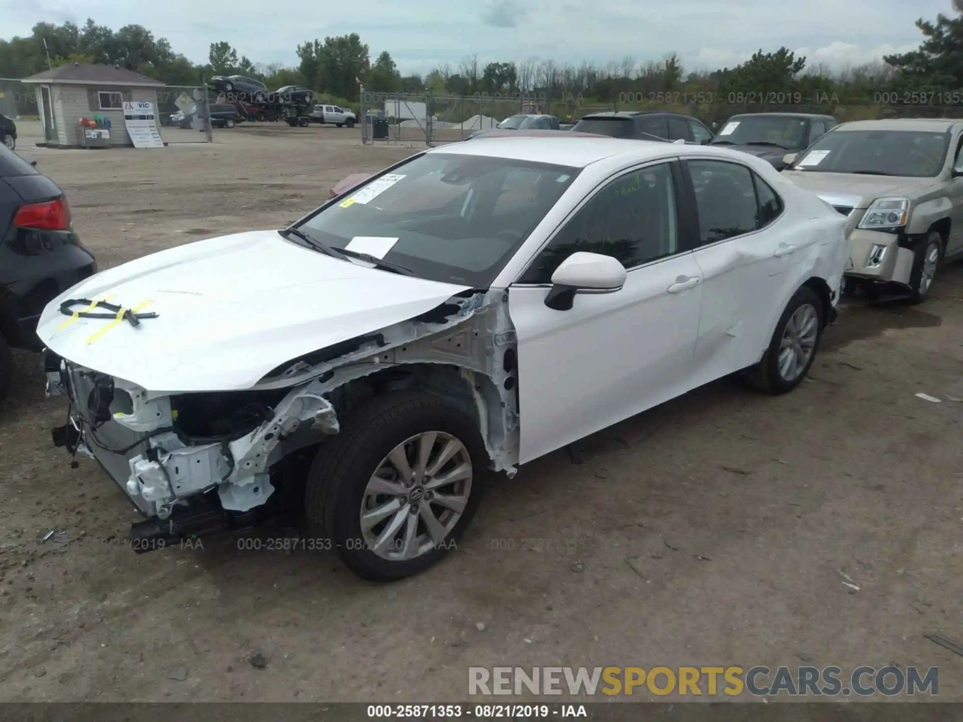 2 Photograph of a damaged car 4T1B11HK5KU752575 TOYOTA CAMRY 2019