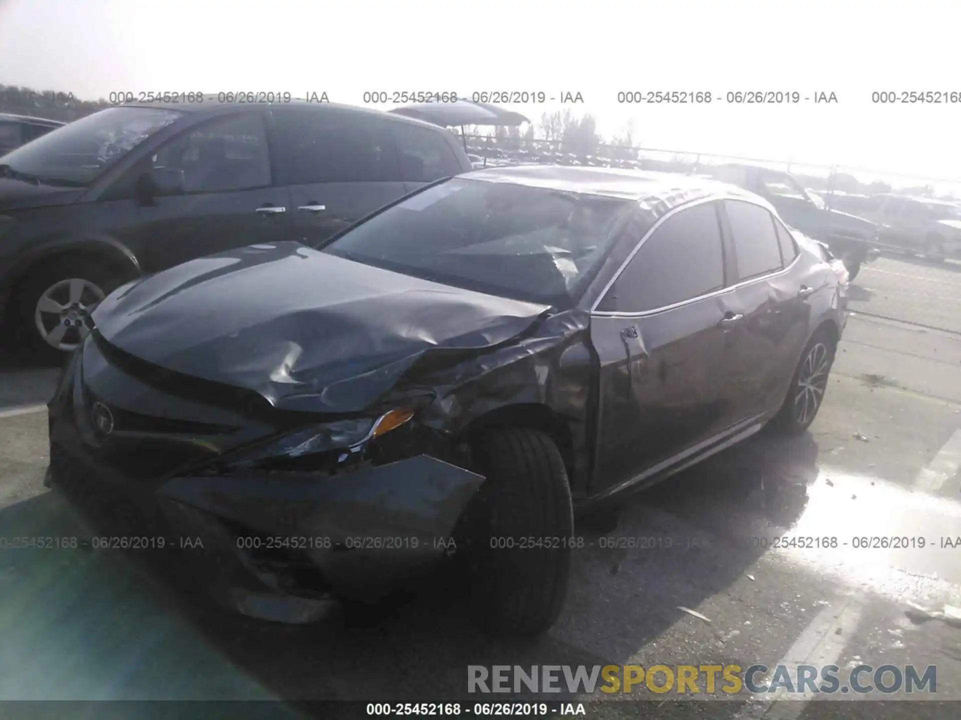 2 Photograph of a damaged car 4T1B11HK5KU753046 TOYOTA CAMRY 2019