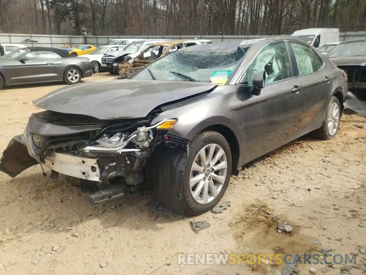 2 Photograph of a damaged car 4T1B11HK5KU754679 TOYOTA CAMRY 2019