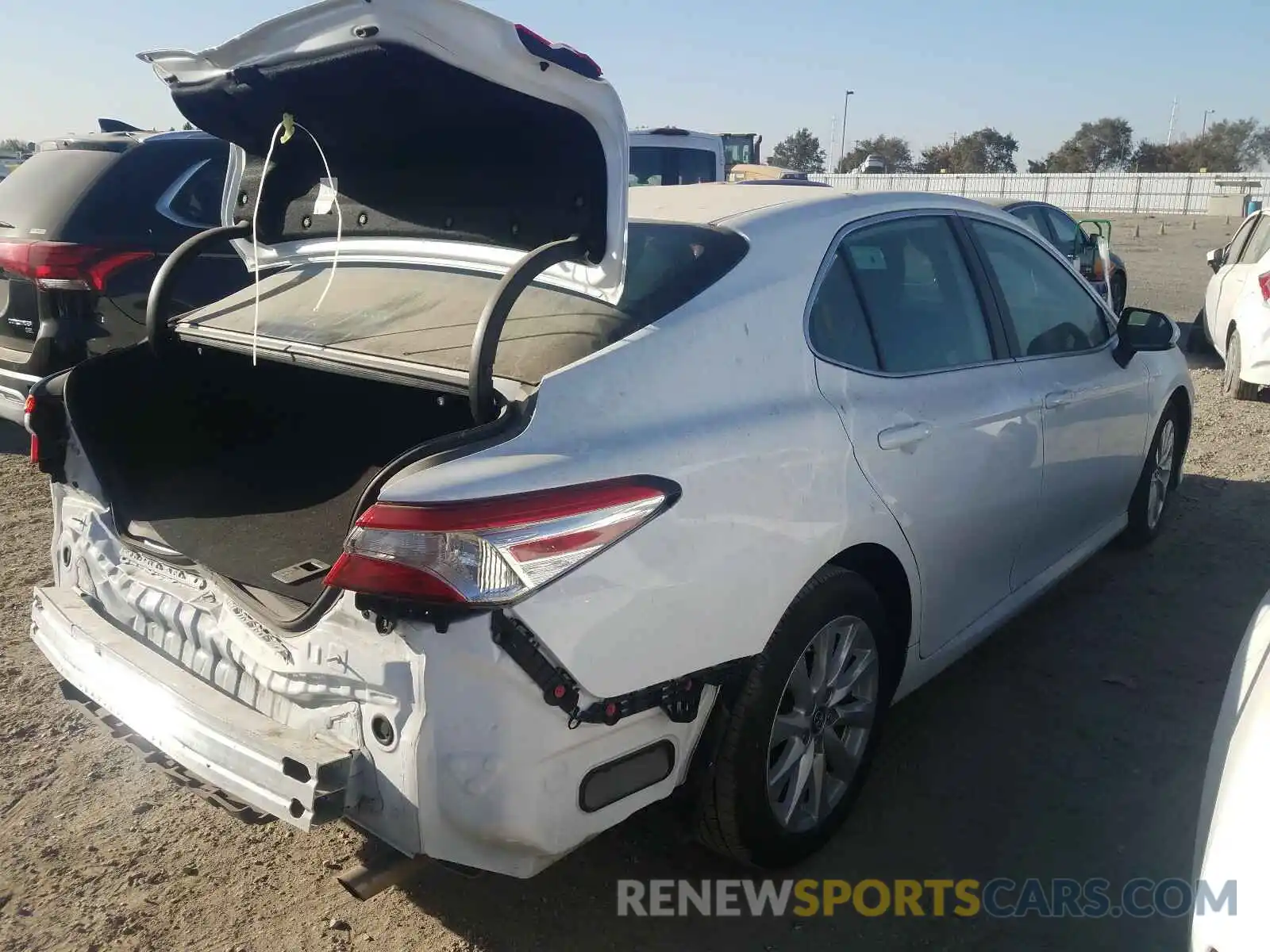 4 Photograph of a damaged car 4T1B11HK5KU754682 TOYOTA CAMRY 2019