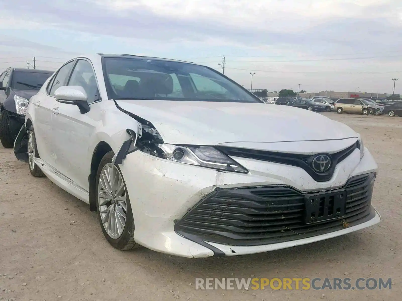 1 Photograph of a damaged car 4T1B11HK5KU755721 TOYOTA CAMRY 2019