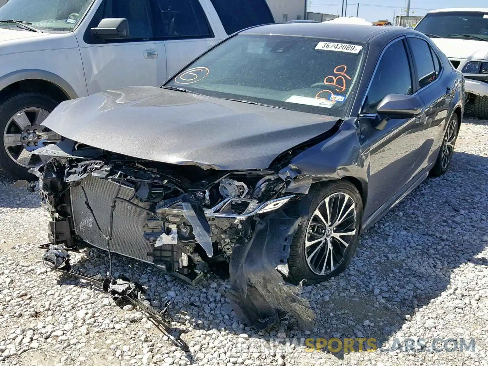 2 Photograph of a damaged car 4T1B11HK5KU759896 TOYOTA CAMRY 2019