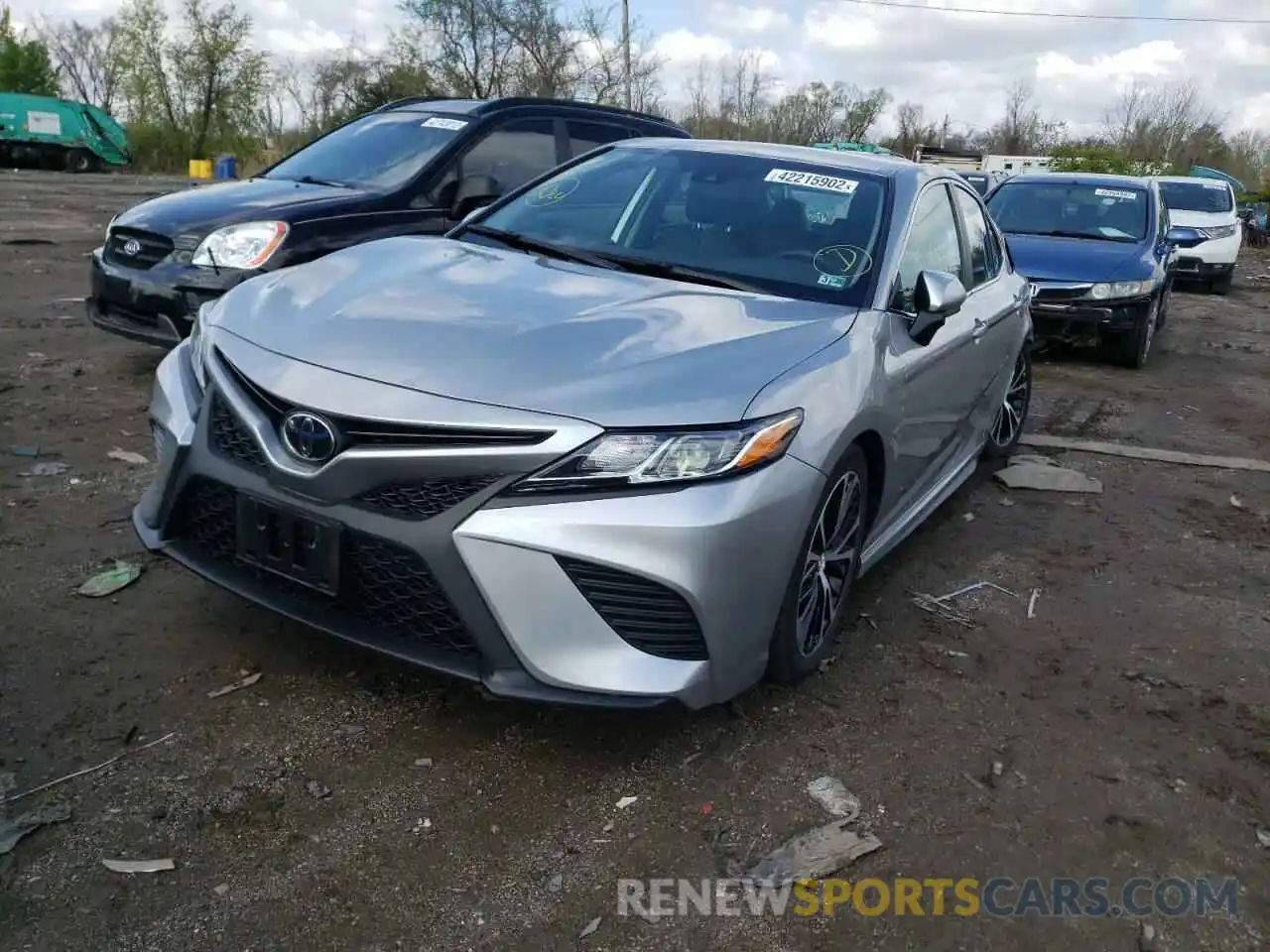 2 Photograph of a damaged car 4T1B11HK5KU760756 TOYOTA CAMRY 2019