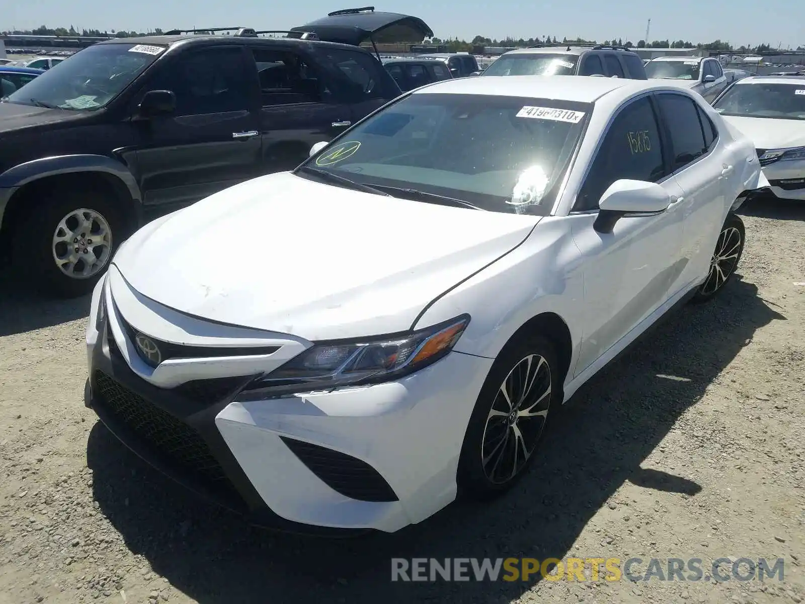 2 Photograph of a damaged car 4T1B11HK5KU761843 TOYOTA CAMRY 2019