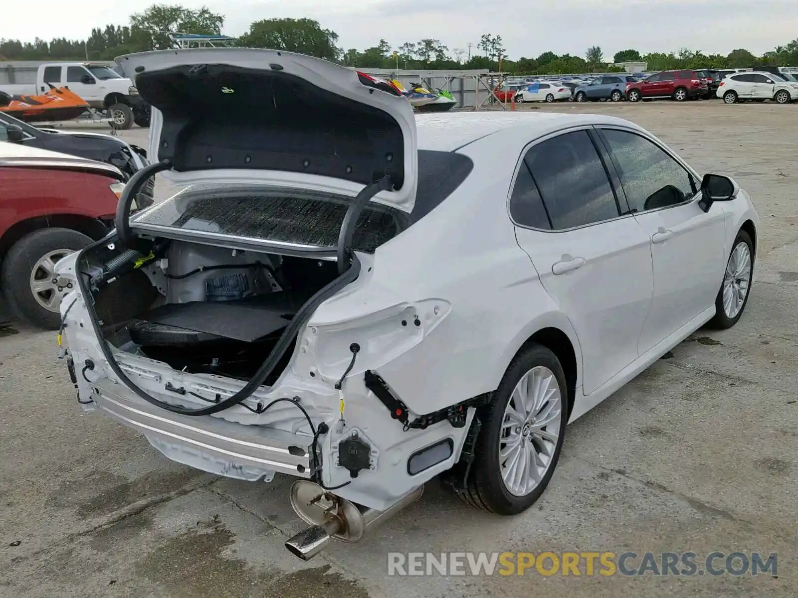 4 Photograph of a damaged car 4T1B11HK5KU765178 TOYOTA CAMRY 2019