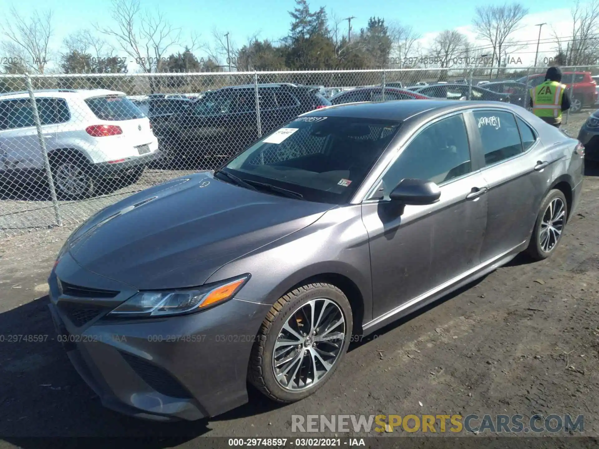 2 Photograph of a damaged car 4T1B11HK5KU765875 TOYOTA CAMRY 2019