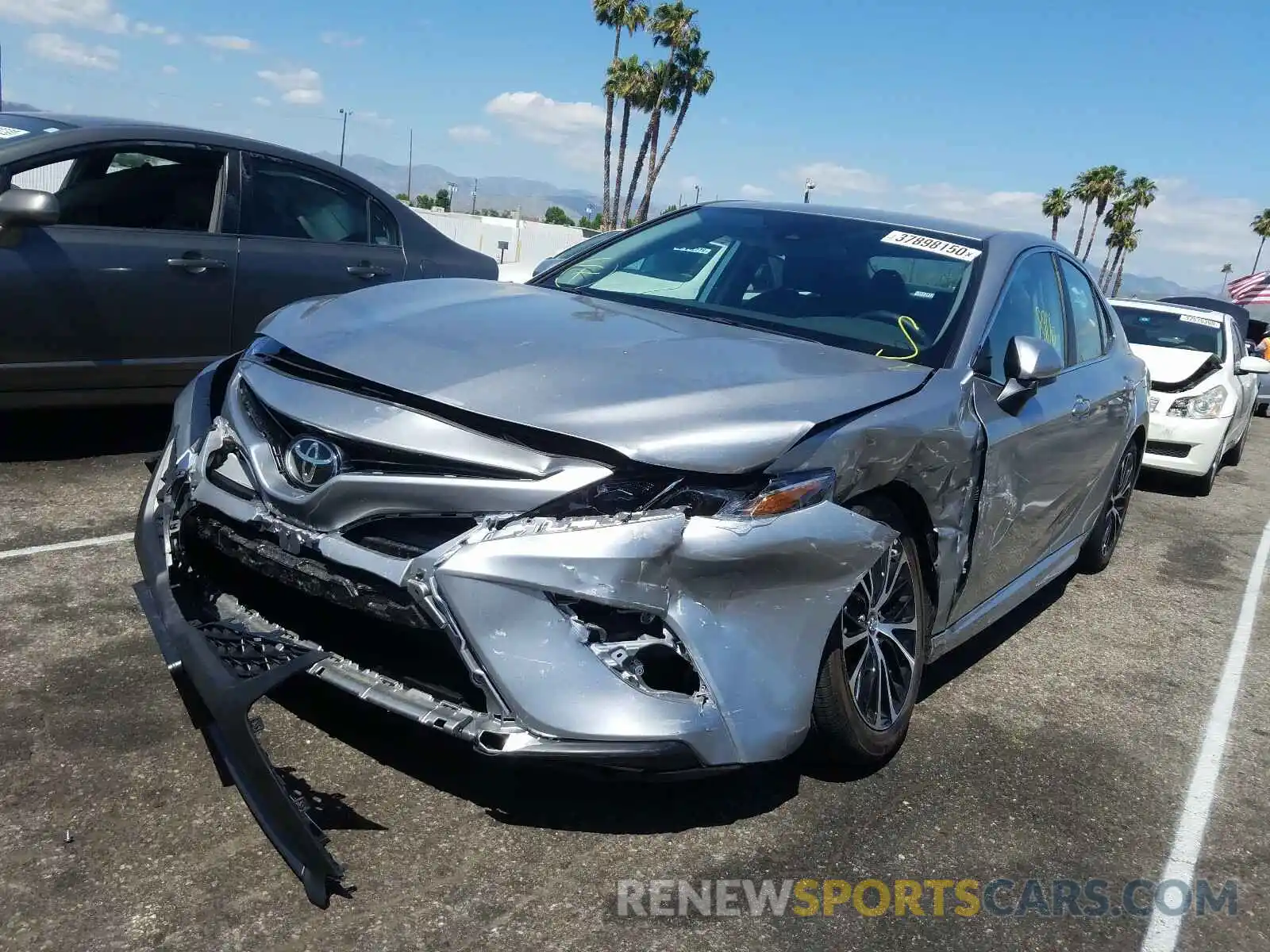 2 Photograph of a damaged car 4T1B11HK5KU768386 TOYOTA CAMRY 2019