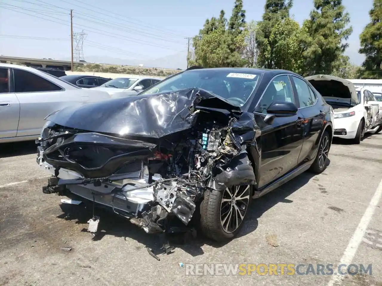 2 Photograph of a damaged car 4T1B11HK5KU772843 TOYOTA CAMRY 2019