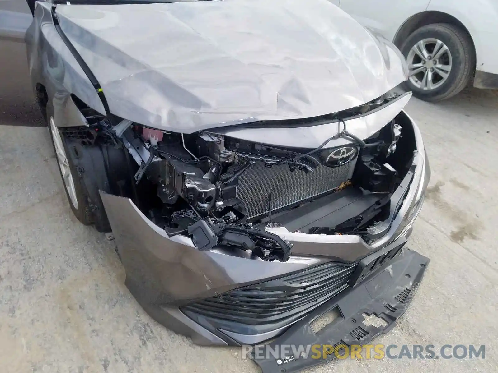 9 Photograph of a damaged car 4T1B11HK5KU773409 TOYOTA CAMRY 2019