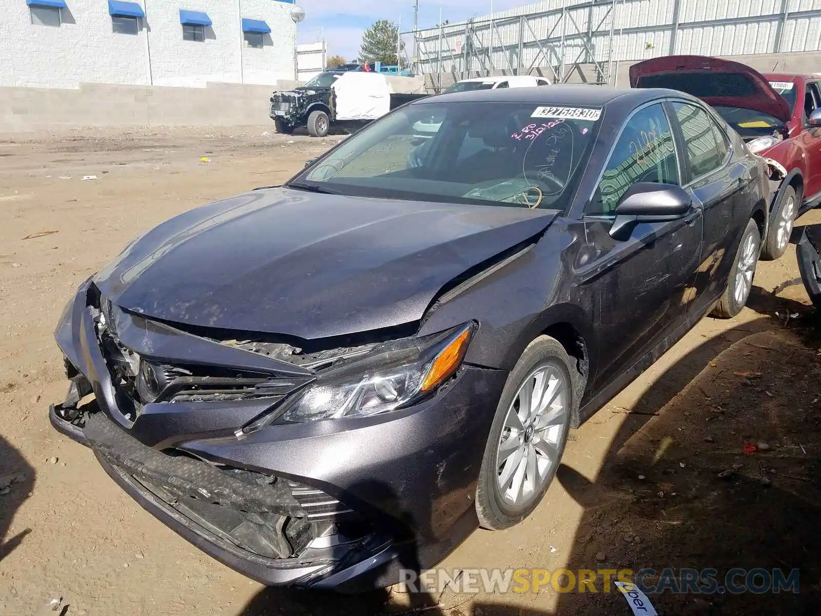 2 Photograph of a damaged car 4T1B11HK5KU773619 TOYOTA CAMRY 2019