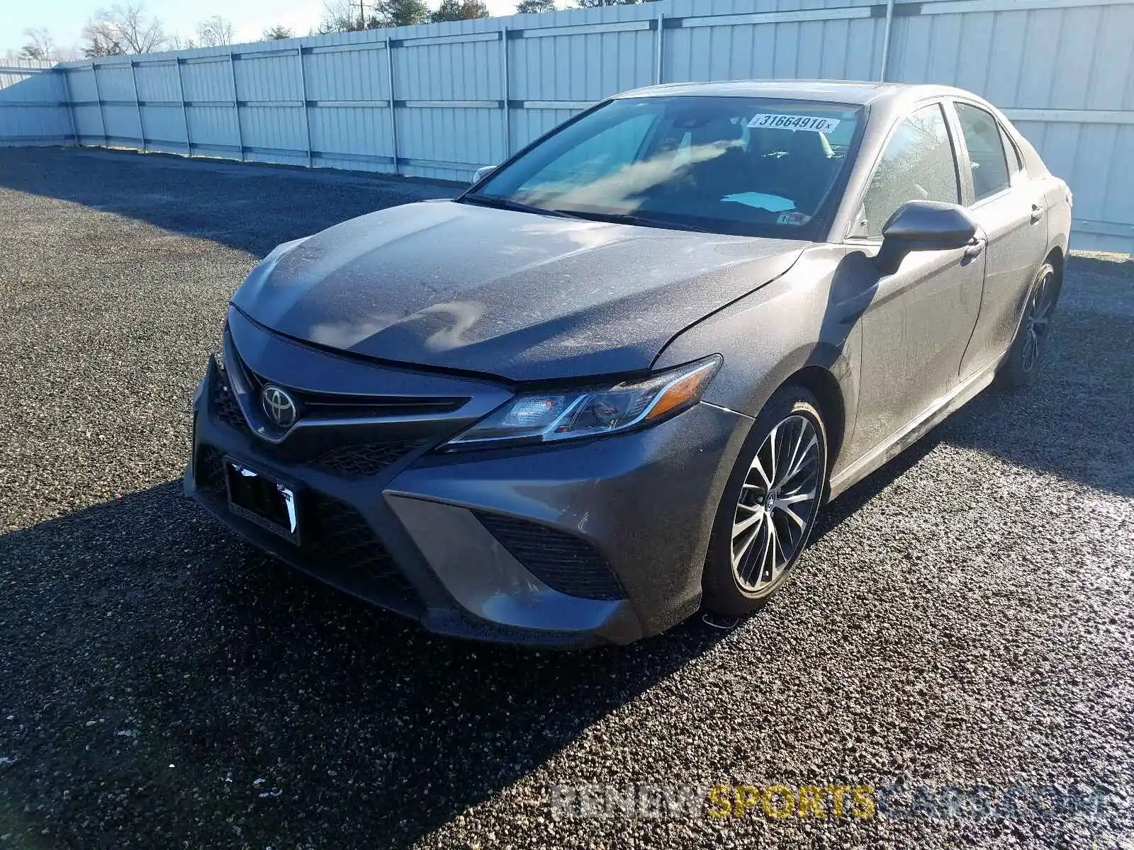 2 Photograph of a damaged car 4T1B11HK5KU778593 TOYOTA CAMRY 2019