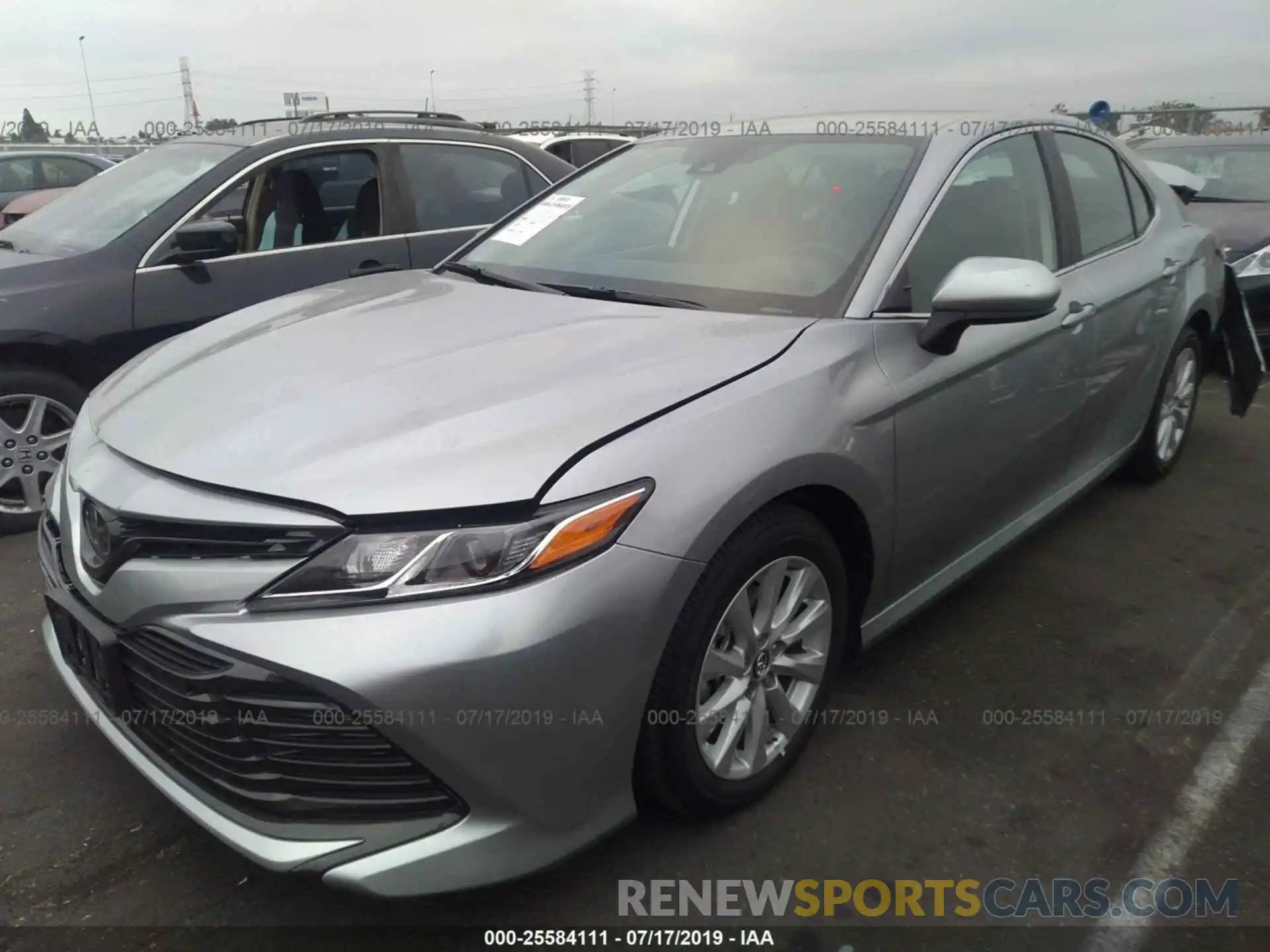 2 Photograph of a damaged car 4T1B11HK5KU779145 TOYOTA CAMRY 2019