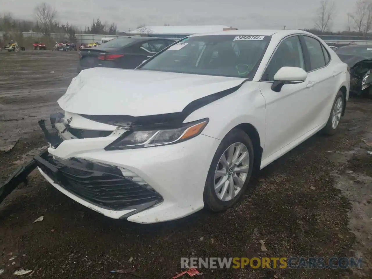 2 Photograph of a damaged car 4T1B11HK5KU779727 TOYOTA CAMRY 2019