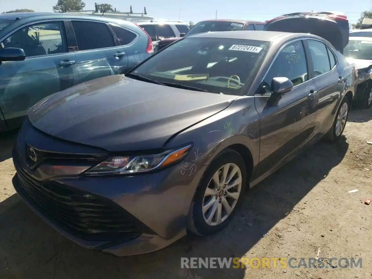 2 Photograph of a damaged car 4T1B11HK5KU782028 TOYOTA CAMRY 2019