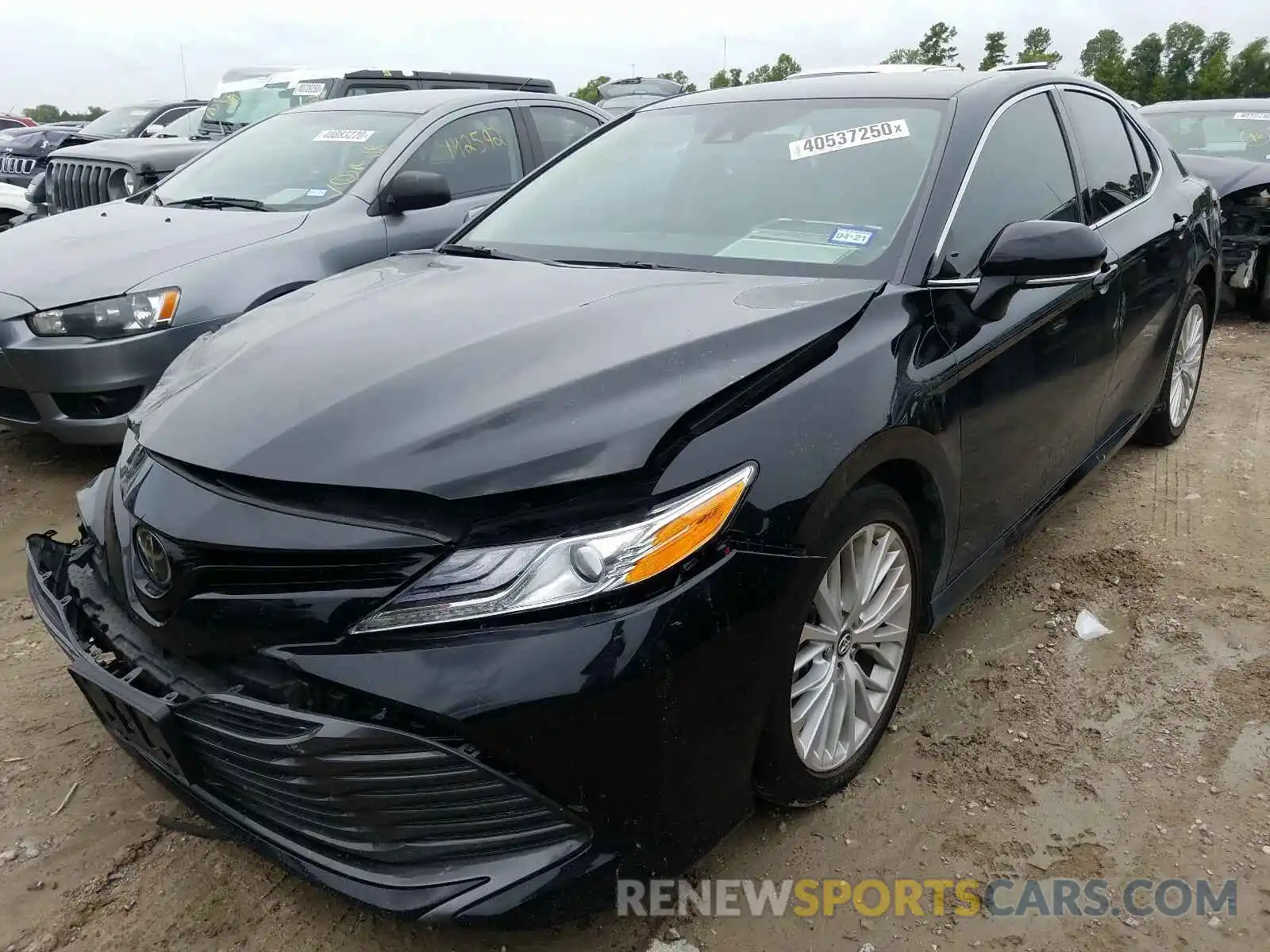 2 Photograph of a damaged car 4T1B11HK5KU783874 TOYOTA CAMRY 2019