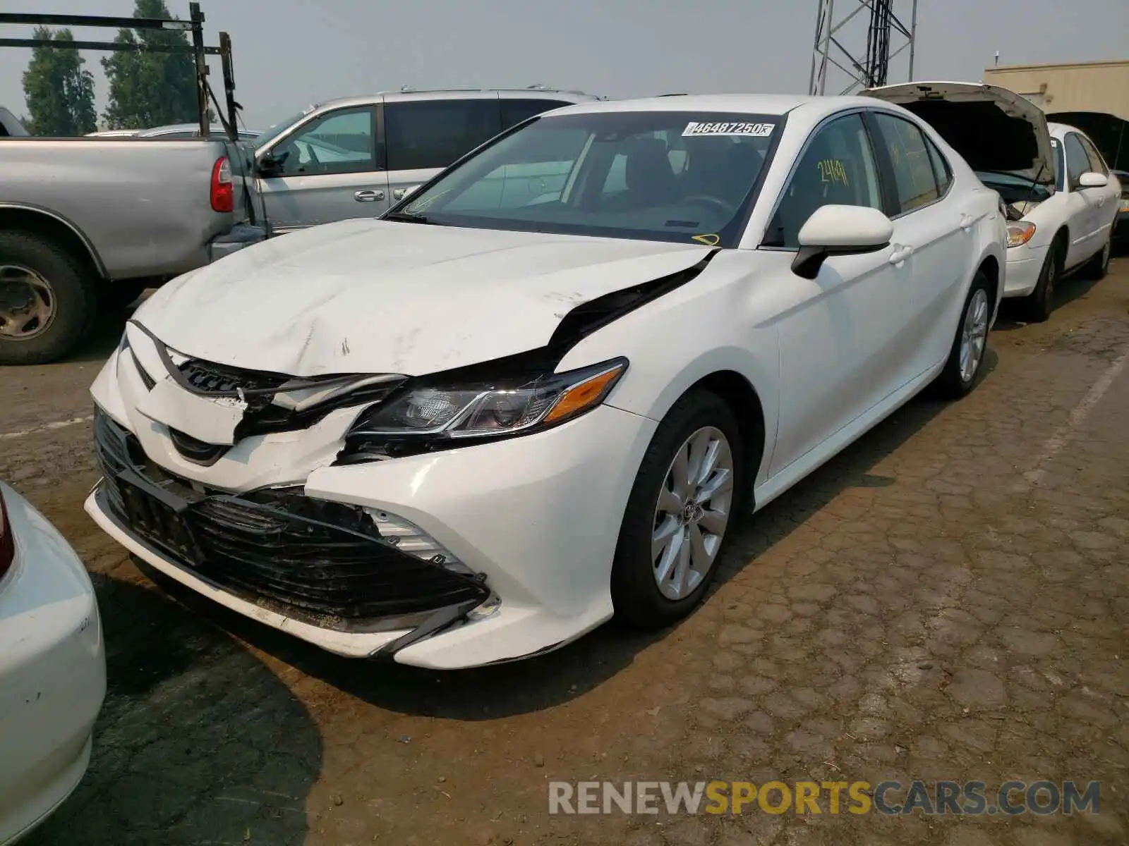 2 Photograph of a damaged car 4T1B11HK5KU784815 TOYOTA CAMRY 2019