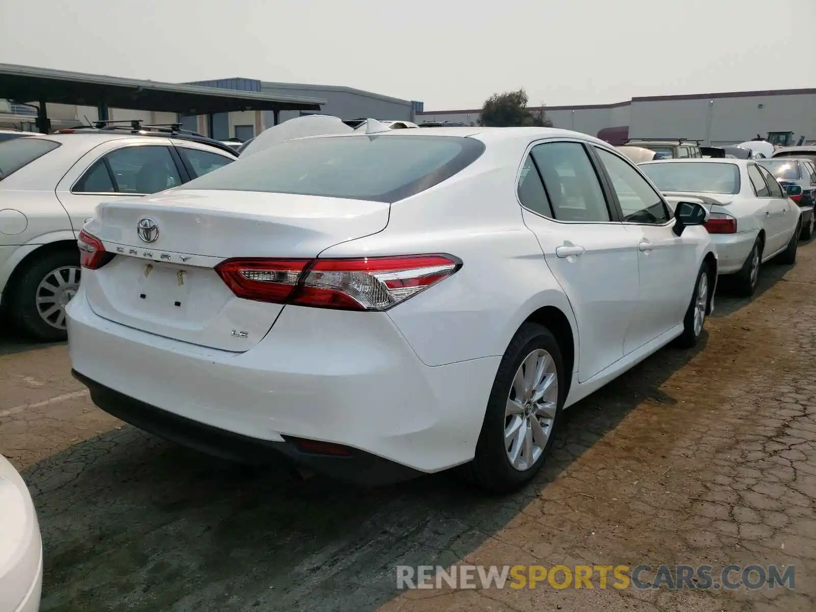 4 Photograph of a damaged car 4T1B11HK5KU784815 TOYOTA CAMRY 2019