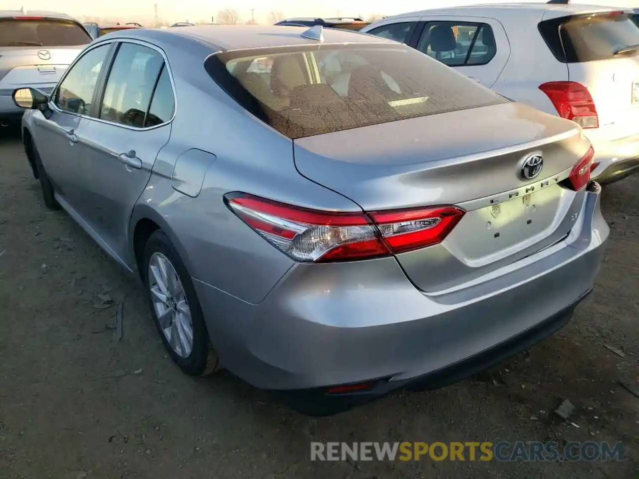 3 Photograph of a damaged car 4T1B11HK5KU786354 TOYOTA CAMRY 2019