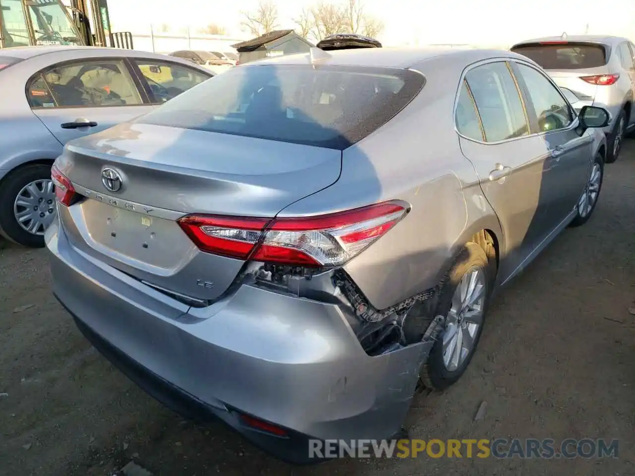 4 Photograph of a damaged car 4T1B11HK5KU786354 TOYOTA CAMRY 2019