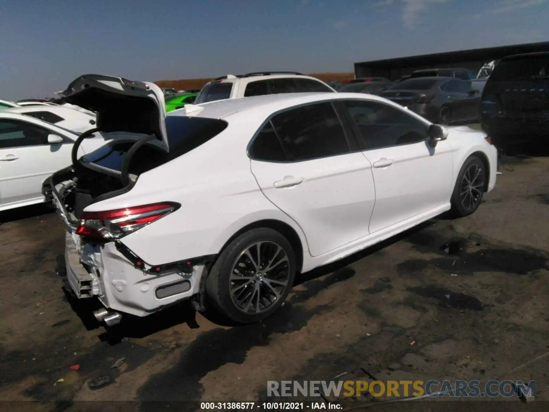 4 Photograph of a damaged car 4T1B11HK5KU788623 TOYOTA CAMRY 2019