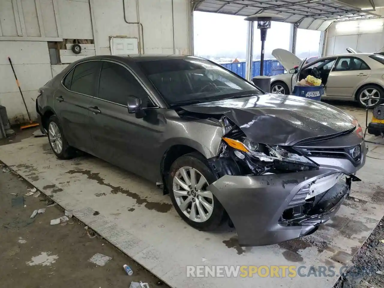 4 Photograph of a damaged car 4T1B11HK5KU788962 TOYOTA CAMRY 2019