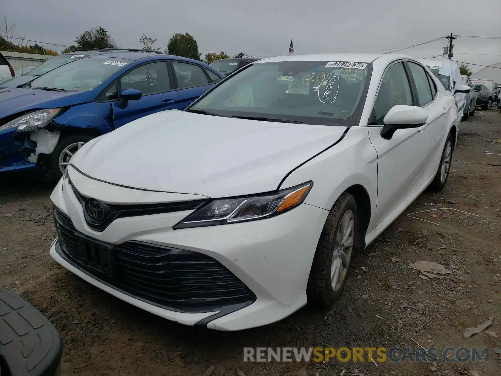 2 Photograph of a damaged car 4T1B11HK5KU790159 TOYOTA CAMRY 2019