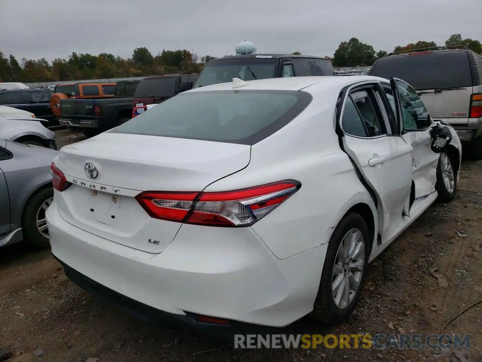 4 Photograph of a damaged car 4T1B11HK5KU790159 TOYOTA CAMRY 2019