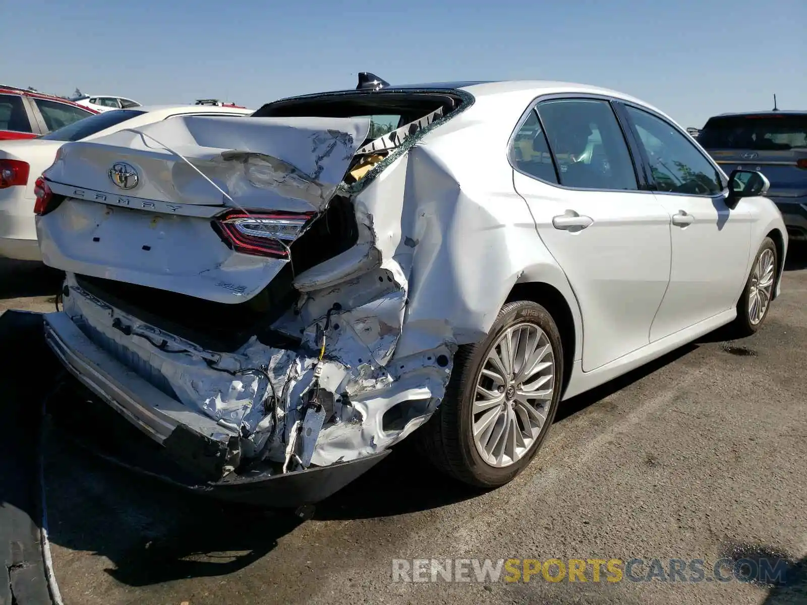 4 Photograph of a damaged car 4T1B11HK5KU790680 TOYOTA CAMRY 2019